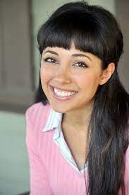 She also plays guitar and piano. Yvette Gonzalez Nacer Image