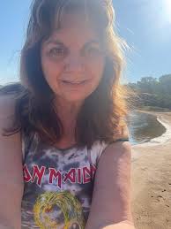 the luck duck quacks as another duck comes in for a landing.playing wasting  love. up the irons!