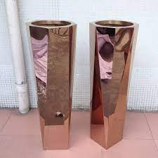 The fake flowers are suit for wedding,bedroom,garden,balcony,shopping shopand etc. China Tall Slim Metal Flower Vase With Mirror Rose Gold Color China Metal Flower Pot And Garden Flower Pot Price