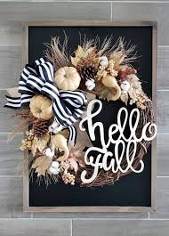 Such a sharp contrast between the soft, delicate flowers and the harsh, crisp leaves of the purple wreath is most unexpected! 50 Fall Wreaths For Front Door To Cherish This Beautiful Autumn Season Hike N Dip