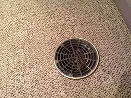 What to look for 3. Close Up Of Floor Drain Cover Over Carpet Basement Flooring Basement Floor Drain Floor Drain