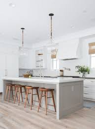 A Minimal Neutral Interior Design For A An Open Kitchen Concept Amber Interiors White Kitchen Design Kitchen Designs Layout Kitchen Design