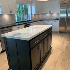 Kitchen Island With Seating And Tapered Legs In 2020 Custom Kitchen Island Kitchen Island With Seating Kitchen Island Cabinets