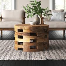 Welland rustic round old elm wooden coffee table. Coffee Tables Joss Main