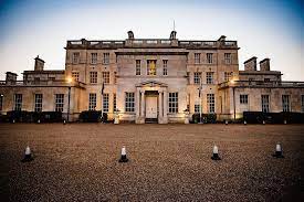 The throwing of the boquet. Real Weddings At Addington Palace In Surrey Uk