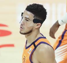 It's easy to look at booker and the suns in the nba finals awaiting the winner of the milwaukee bucks vs. Booker Unsure Of Facemask S Future Bright Side Of The Sun