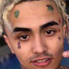 A tribal cross tattoo is the perfect mix of tradition and religion that consists of interlocking patterns and bold intricate designs made with rich black color. Top 10 Famous Rappers With Face Tattoos Tattoo Me Now