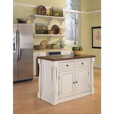 These simple worktables, situated near the hearth these furniture pieces, styled after vintage worktables, often have drawers and open shelves. Homestyles Monarch White Kitchen Island With Seating 5020 948 The Home Depot