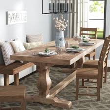 Reclaimed wood adds a beautiful rustic touch to any farmhouse home. Real Wood Dining Table