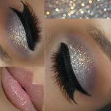 Black And Silver Eye Makeup Cool Toned Silver Glitter On The Lid Mauve Y Taupe Crease Black Winged Liner Glossy Pink Lips Theamazingworl Silver Eye Makeup Silver Makeup Glitter Makeup