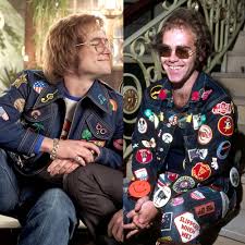 Rocketman stars taron egerton, bryce dallas howard, and richard madden reveal the most surprising thing they discovered about elton john while filming the musical biopic. Rocketman Cast Real Life Comparison What Do Elton John John Reid Bernie Taupin Really Look Like