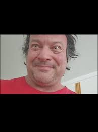 Devon Challenges Ermes to Left-Handed Arm Wrestling Match