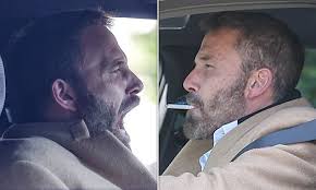 Tense Ben Affleck puffs