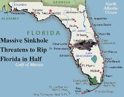 massive sinkhole threatens to rip