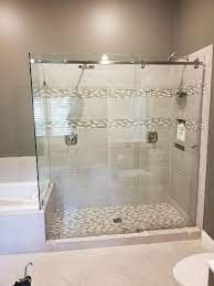 Install for ovation curved glass bathtub door. Cleveland Glass Shower Enclosures Custom Mirror Glass