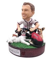 (courtesy of humane rescue alliance) (hra/humane max scherzer's dominant stretch has helped the nationals climb back above.500. New Nationals Bobblehead Released Of Max Scherzer With His Four Dogs
