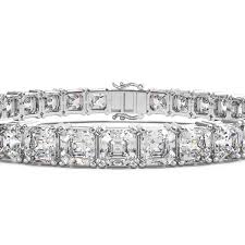 As diamond tennis necklaces have diamonds all the way around the neck, they usually start at 5 carats and go up to 25 carats total diamond weight, and generally cost from $5000 up to $250,000. 30 Carat Asscher Diamond Tennis Bracelet Raven Fine Jewelers