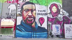 The odds of lightning striking the side of a building like that pinpointing a mural of a controversial. George Floyd Mural Painted On West Bank Barrier The Global Herald
