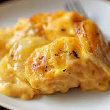 Cheesy Scalloped Potatoes Recipe Yummly Recipe Haitian Food Recipes Cheesy Scalloped Potatoes Recipe Scalloped Potato Recipes