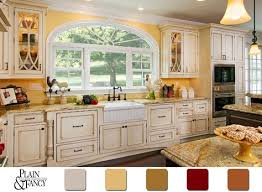 This Cottage Kitchen Has A Lovely Country Color Scheme Yellow Kitchen Colorp Country Kitchen Cabinets French Country Kitchen Cabinets Country Kitchen Colors