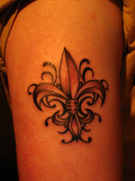 It is an official mark of the state, and the image is currently trademarked by the new orleans saints, which is their nfl team. Fleur De Lis Tattoo Pics Page 5 New Orleans Saints Saintsreport Com