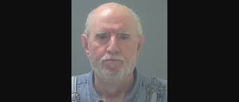 Milton man charged with trying to run over his neighbor with his car