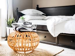 A minimalist guest bedroom with a bed and a desk by the window is done flawless and seamless. Home Office Guest Room Ideas That Save You Space