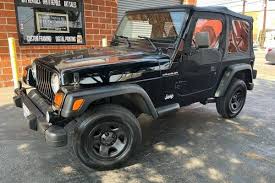 Image result for Brilliant Black 2002 Jeep