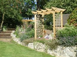 Post are buried in a 2′ hole with concrete. Arbour Pergola Plan