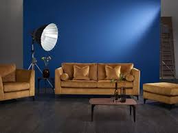 Comprising a stainless steel frame with bronze finish, it features a sliding display top of clear tempered glass and a bottom of mirrored glass. Louise Redknapp Launches Bold By Louise Sofa Collection With Harveys Furniture