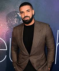 A woman walks into an la tattoo shop and says, i want you to tattoo 'drake' across my forehead.. Drake Rihanna Tattoo Does Drake Have Rihanna S Face On His Arm
