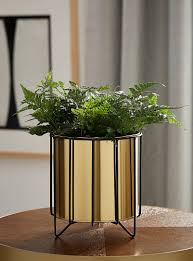 Black And Gold Design For Pots Gold Planter With A Matte Black Holder Gold Planter Modern Centerpieces Planters