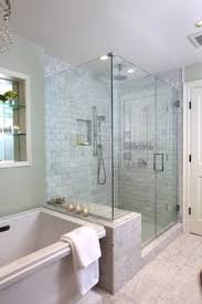 A glass shower wall is a great way to make a small bathroom feel large. 17 Glass Walled Showers Ideas Bathroom Design Bathrooms Remodel Shower Doors