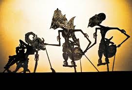 In this photograph taken on februay 20 an indonesian master puppeteer moves a wayang kulit puppet before a white screen during a cultural festival in. Pin By Michael Paieda On Dimensional Tekstur Art Wayang Kulit Shadow Puppets