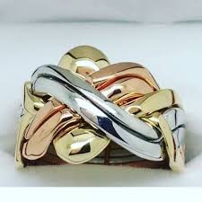 This is a puzzle ring and is extremely difficult to put back together. 18k Tricolored Gold 6 Band Turkish Puzzle And 35 Similar Items