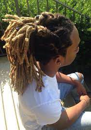 Elevate Your Long Dreadlocks Look With The Dreadlocks Ponytail Hairstyle Hair Styles Dyed Dreads Dyed Hair Men