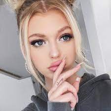 Here is a jaw dropping detailed tattoo of a tiger head on the middle finger of this woman. Always Tattoo On Loren Gray S Middle Finger