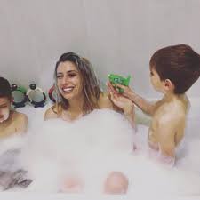 Son bath with mom