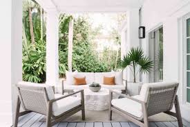 Use tall, narrow planters to draw eyes up from the patio floor. 22 Deck Decorating Ideas For A Beautiful Backyard