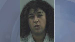 Woman stabs boyfriend, prevents him from leaving, police say