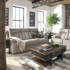 Grab Some Snacks A Good Movie And Kick Your Feet Up With The Mitchiner Grey Reclining Sofa With Drop Down Table By Ashley Furniture With Images Furniture Ashley Furniture