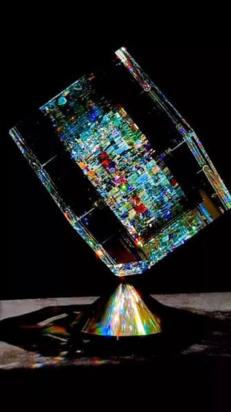 This one-of-a-kind optical glass sculpture dances with captured light.  Every rotation revealing new galaxies of color, depth, and impossible  beauty. Hypnotic. Eternal. Pure magic in crystal form.