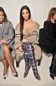 Depending on your type, you. Braless Kim Kardashian In Off The Shoulder Trench Coat At Balenciaga Pfw Daily Mail Online