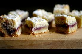 Brush cookies with holes in center with reserved egg white. Austrian Raspberry Shortbread Smitten Kitchen