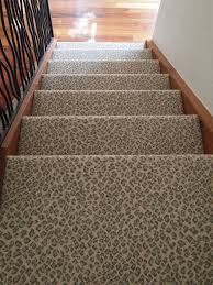 The combination of looped and texture fibers adds interesting dimension to the carpet. Stylish Patterned Stair Carpet For Staircase Gabdearq