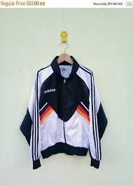 It soon became the choice of footwear for indoor football players worldwide. Vintage Adidas Germany Jacket Adidas Sweater Adidas Jacket Etsy Adidas Jacket Vintage Adidas Adidas Sweater