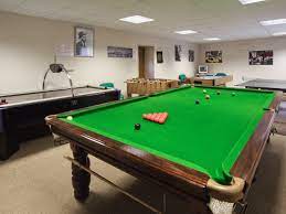 Games Room With Table Tennis Pool Table Table Football And Air Hockey Table Air Hockey Table Game Room Snooker