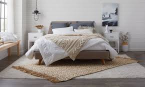 Layered Rug Ideas To Transform Your Space Large Bedroom Rugs In 2020 Bedroom Rug Placement Layered Rugs Living Room Large Bedroom Rugs