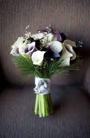 Just one look at calla lily bridal bouquet pictures can inspire a bride to choose this elegant and romantic flower for her bouquet. 67 Beautiful Winter Wedding Bouquets Weddingomania Winter Wedding Bouquet Winter Wedding Flowers Lily Bouquet Wedding