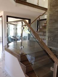 Glass Panels In A Metal Rail For Staircase Description From Pinterest Com I Searched For This On Bing Glass Railing Stairs Indoor Stair Railing Modern Stairs